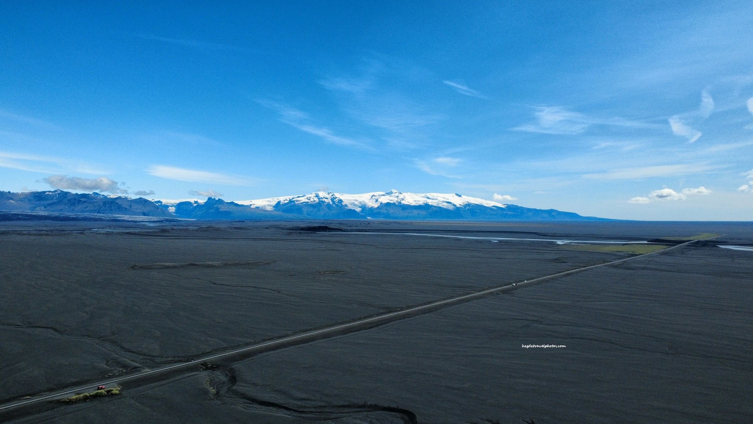 Skeiðarársandur: Black Sand Plains and Snow-Capped Mountains in Iceland